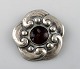 Danish Art 
Nouveau brooch 
in silver. 
Early 1900s.
Stamped.
Measures: 28 
mm.
In very good 
...