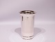 Simpel vase 
dekorated with 
elegant edge at 
the bottom, 
hallmarked 
silver from 
Cohr.
H - 18,5 cm 
...