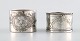 Two Swedish 
napkin rings in 
silver. Early 
20 th century.
Stamped. 826 
and 830.
In good ...