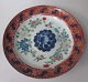Imari dish, 
approx.1850. 
Japan. Polycrom 
decorated with 
flowers and 
birds. With 
gilding. ...
