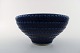 Wilhelm Kåge 
for 
Gustavsberg, 
Large ceramic 
bowl in 
beautiful dark 
blue glaze.
Modern stylish 
...