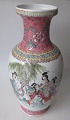 Chinese vase, 
porcelain, 
famille rose, 
20th century. 
Polycrom 
decoration with 
women in a 
garden. ...