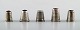 Five Danish 
thimbles in 
silver.
Stamped: 830s. 
Early 20 c.
Size: 25 mm. x 
15 mm.
Good 
condition.