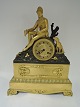 French Bronze 
clock with 
Seated Hunter. 
Height 39 cm. 
Produced 
approx. 1840. 
Clockwork is 
alright.