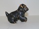 Small Royal 
Copenhagen 
stoneware 
figurine, dog.
Designed by 
artist Jeanne 
Grut.
Decoration ...