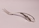Carving fork, 
no.: 35 by O. 
Mogensen in 925 
sterling 
silver.
23 cm.