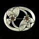Fritz S. 
Heimbürger 
1925-1948. Art 
Nouveau Silver 
Brooch with 
Garnets
Designed and 
crafted by ...