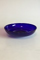 Blue Glass 
Bowl. Measures 
6.3 cm x 21 cm 
dia / 2 31/64 
in. x 8 17/64 
in. dia