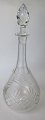 Crystal carafe, 
20th century. 
With grinding 
and stopper. H: 
33 cm.