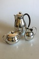 Hans Hansen 
Sterling Silver 
Coffee Set. 
Consists of 
Coffee Pot, 
Creamer and 
Sugar Bowl. 
Handle ...