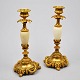 Pair of French 
new rococo 
ormelu bronze 
candlesticks 
with alabaster. 
19th century. 
Height. 25 cm.