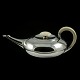 Svend Weihrauch 
- F. 
Hingelberg. 
Sterling Silver 
Tea Pot with 
Ivory Handles.
Designed by 
Svend ...