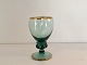 Gisselfeldt 
beautiful blue 
/ green white 
wine glass with 
gold edge 12cm 
high, 6.5cm in 
diameter ...
