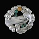 Georg Jensen. 
Silver Dove 
Brooch with 
Agate & Amber 
#70. 1904-08 
Hallmarks
Dove motif 
design by ...