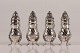Set of 4 salt + 
peber shakers 
made of solid 
silver 830s by 
Danish Hugo 
Grûn in ...