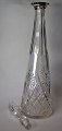 Crystal carafe, 
20th century. 
With grinding 
and stopper. 
Height: 41 cm.