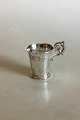 Little Cup in 
Silver with 
handle. 
Measures 7.8 cm 
/ 3 5/64 in. 
Weighs 49 g / 
1.75 oz.
