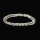Karen Strand 
1924-2000. 14k 
White Gold 
'Serpentine' 
Bracelet.
Designed and 
crafted by 
Karen ...