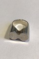 Hans Hansen 
Sterling Silver 
Ring. Raised 
symmetrical 
decoration. 
Ring size 52 US 
6, weight 14,1 
...