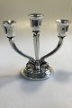 Evald Nielsen 
Sterling Silver 
3-light 
candelabra with 
chased foliate 
on stepped base 
H 22 ...