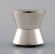 Jens H. 
Quistgaard 
style of. 
Danish design, 
1960 s.
Double-sided 
candlestick in 
silver-plated 
...