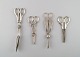 Four Danish and 
European 
scissors and 
tongs in 
silver, Grann & 
Laglye 830s.
Measures: 
10-16 ...