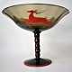 Glass on foot, 
smoke colored, 
art deco, 20th 
century. 
Decorated with 
red / black 
enamel painting 
...