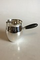 Georg Jensen 
Sterling Silver 
Water Jug with 
Handle of Ebony 
No 80 E. 
Measures 11.5 
cm / 4 17/32 
...