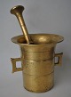 Large pharmacy 
brass mortar 
with pistil, 
19th century. 
Height: 16 cm. 
L. pistil: 26.5 
...