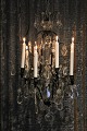 Very beautiful 
antique crystal 
chandelier in 
black iron 
frame with 
space for eight 
candles.
The ...