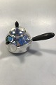 Georg Jensen 
Sterling Silver 
Tea Pot No 80B 
with Ebony 
handle H 14.0 
cm/5.51" Diam: 
14,1 ...