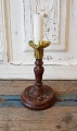 19th century 
candlestick 
made in wood 
and brass, 
shaped like a 
heart, the 
candlestick is 
a ...