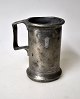 Buntzen 
measuring cup 
in pewter, 
1888, 
Copenhagen, 
Denmark. 1/2 
pot. With 
handle. 
Stamped. ...
