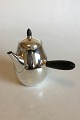 Georg Jensen 
Sterling Silver 
Coffee Pot with 
Ebony Handles 
No 80D. 
Measures 19.5 
cm / 7 43/64 
...