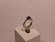Ring of 925 
sterling silver 
with saphire 
and clear 
stones, stamped 
JAa.
Size 56.