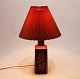 Red table lamp 
in ceramic by 
Desiree Stone 
ware factory 
from the 1970s. 
The lamp is in 
great ...