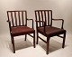 These armchairs 
exude timeless 
elegance and 
sophistication, 
with their 
mahogany wood 
...