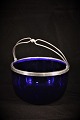 Old Candy bowl 
in blue glass 
with silver 
border and 
handle. Stamped 
830S.
H: 7cm. 
Dia.:11,5cm.