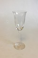 Holmegaard 
Eclair White 
Wine Glass. 
Designed by 
Ann-Sofi Romme 
1987. Measures 
21 cm / 8 17/64 
in.