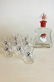 Christmas 
carafe with 8 
small glasses. 
Decorated with 
Santa Claus. 
The Carafe is 
spherical ...