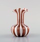 "Zanfirico" 
Murano, brown 
and white 
striped vase in 
mouth blown art 
glass, 1960s.
In perfect ...