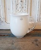 Holmegaard 
pitcher in 
milky white 
glass 
Height 14 cm.