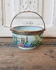 1800s turquoise 
green sugar 
bowl decorated 
with flowers, 
fitted with 
brass handle.
Height 7.5 ...