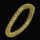 Karen Strand 
1924-2000. 14k 
Gold 
'Serpentine' 
Bracelet.
Designed and 
crafted by 
Karen Strand 
...