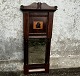 Mirror in 
mahogany fines 
with Intarsia, 
104cm high, 
47cm wide, 
mounted with 
small plastic 
piece ...