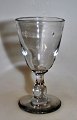 Glass service, 
Christian the 
7th. 19th 
century, 
Denmark.
Port wine 
glass, height 
..: 10.5 cm. 
...