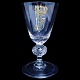Large beautiful 
18th century 
wineglass with 
royal crowned 
monogram in 
gold and air 
bubbles in ...