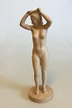P. Ipsen Enke 
Terracot 
figurine of 
standing nude 
woman No 910. 
Designed by V. 
Bahner. 
Measures ...