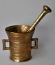 Brass mortar 
with pistil, 
19th century 
Denmark. With 
two handles. 
Height 10 cm. 
Length of ...