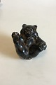 Royal 
Copenhagen 
Stoneware 
Figurine Brown 
bear cub on the 
back with paw 
against paw No 
22747. ...
